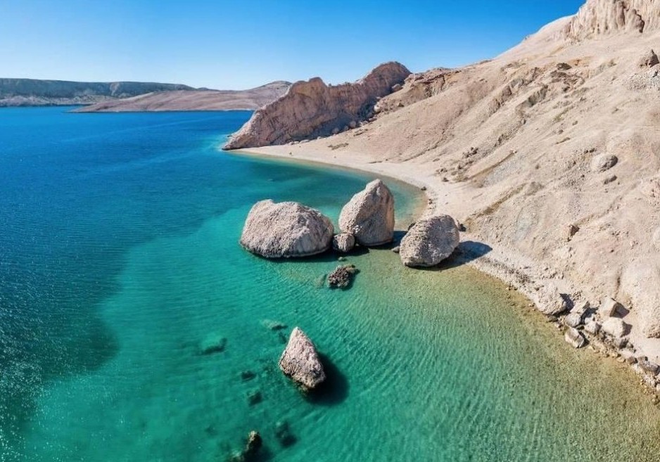 Beritnica Beach on Pag Island Croatia with turquoise Adriatic Sea, iconic rock formations and dramatic limestone landscape