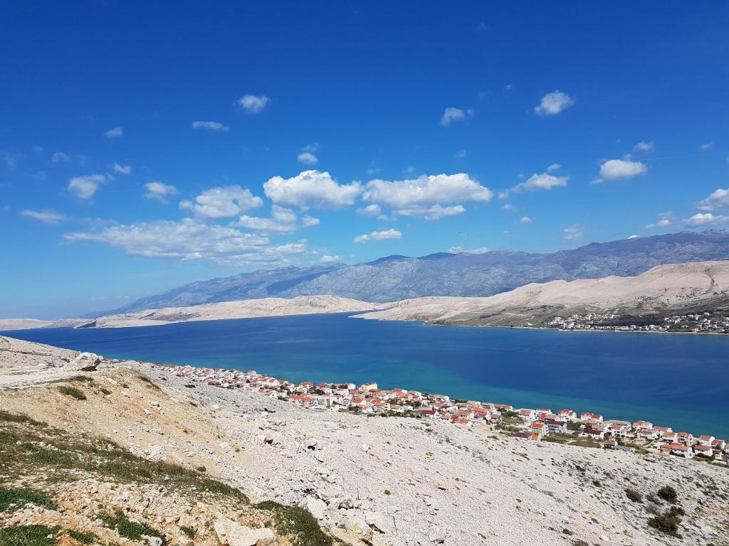 Panoramic view of Pag Island, Pag Bay and the Velebit mountains in Croatia